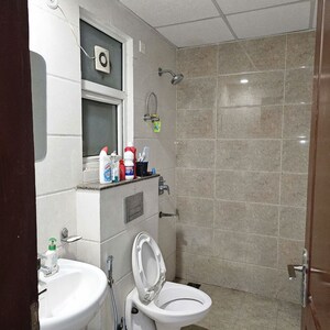 Bathroom in 3 BHK Apartment at Puri Pranayam, Sector 82 – for Rent