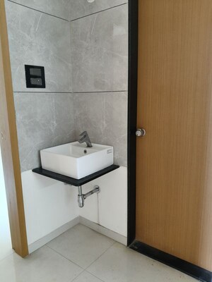 Bathroom in 2 BHK Apartment at Shroff Signature Heights, Wakad – for Rent