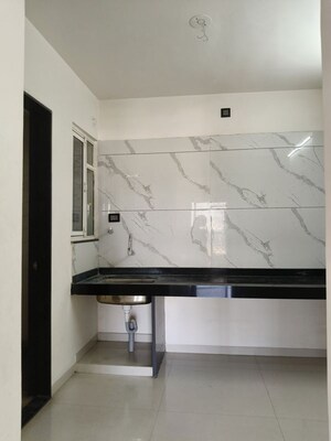 Kitchen in 2 BHK Apartment at Shroff Signature Heights, Wakad – for Rent