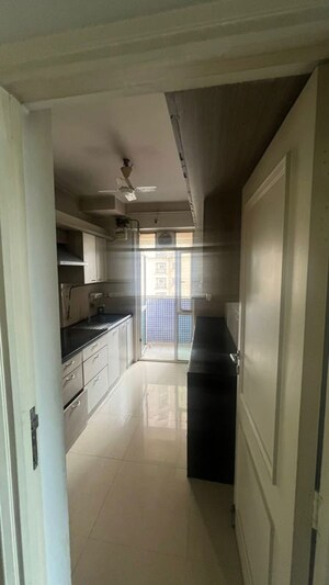 Kitchen in 2 BHK Apartment at Hiranandani Estate Rodas Enclave, Ghodbunder Road – for Sale