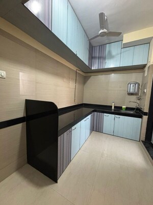 Kitchen in 3 BHK Apartment at Goyal Lakshchandi Heights, Goregaon East – for Rent