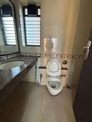 Bathroom in 3 BHK Apartment at Goyal Lakshchandi Heights, Goregaon East – for Rent