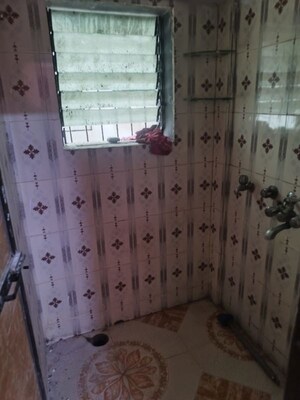 Bathroom in 1 RK Apartment at Blue cheap CHS, Dombivli West – for Rent