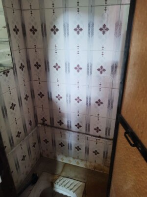 Bathroom in 1 RK Apartment at Blue cheap CHS, Dombivli West – for Rent