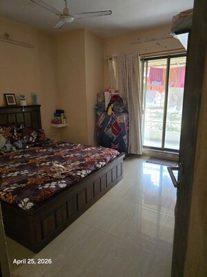 Bedroom in 2 BHK Apartment at Sai Moreshwar CHS, Kharghar Sector 12 – for Rent