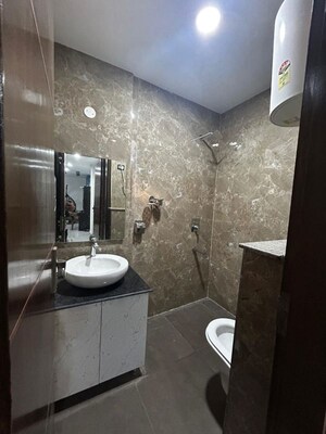 Bathroom in 3 BHK Builder Floor at Freedom Fighters Enclave – for Rent