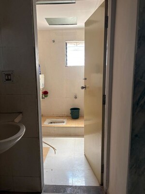 Bathroom in 3 BHK Apartment at Chandkheda – for Rent