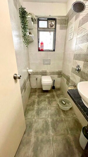 Bathroom in 1 BHK Apartment at Oshiwara – for Sale