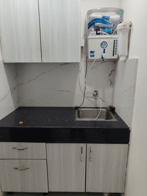 Kitchen in 1 RK Apartment at Dhoot Time Residency, Sector 63 – for Rent