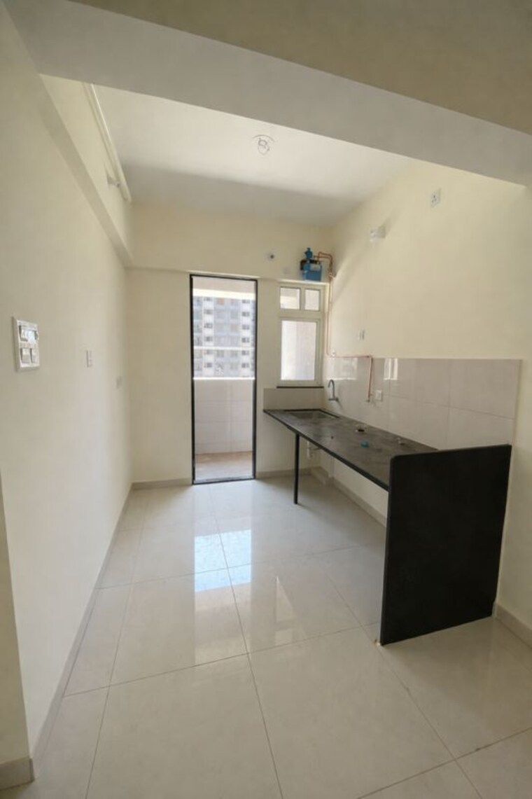 Kitchen, kolte-life-republic-lakefront-residences 1 Bedroom 450 Sq.Ft. Apartment In Hinjewadi Pune 10347996