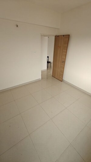 Room in 2 BHK Apartment at Kumar Samruddhi Society, Vishrantwadi – for Rent