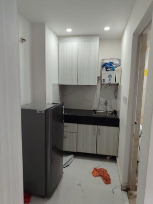 Kitchen in 1 RK Apartment at Dhoot Time Residency, Sector 63 – for Rent