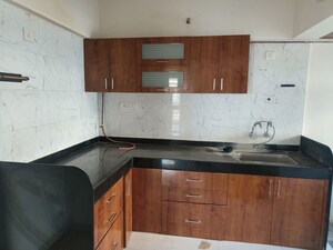 Kitchen in 2 BHK Apartment at Vinode Insignia, Wakad – for Rent