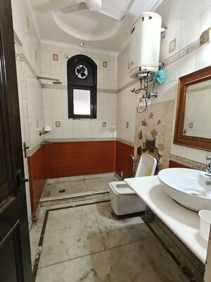 Bathroom in 3 BHK Builder Floor at Ansal Sushant Lok I, Sector 43 – for Rent