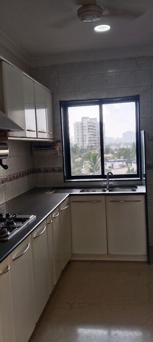 Kitchen in 3 BHK Apartment at Seven Bunglow – for Sale