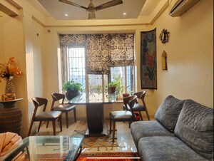 Living Room in 2 BHK Apartment at New Mhada Towers, Andheri West – for Rent