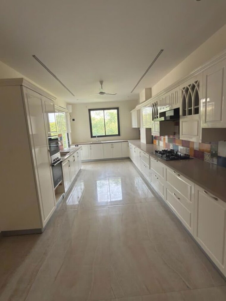 Kitchen, emaar-emerald-hills-phase-2 4 Bedroom 4500 Sq.Ft. Apartment In Sector 65 Gurgaon 10348260