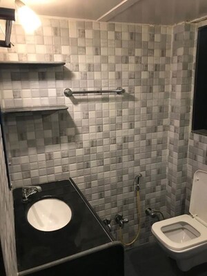Bathroom in 1 BHK Apartment at Versova Manish CHS, Andheri West – for Rent