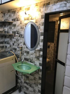 Bathroom in 1 BHK Apartment at Versova Manish CHS, Andheri West – for Rent