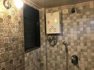 Bathroom in 1 BHK Apartment at Versova Manish CHS, Andheri West – for Rent
