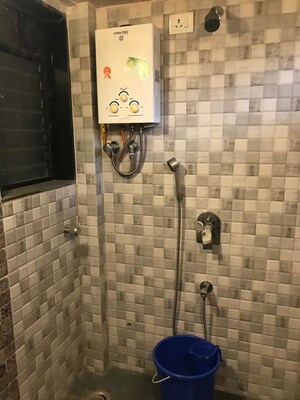 Bathroom in 1 BHK Apartment at Versova Manish CHS, Andheri West – for Rent
