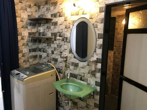Bathroom in 1 BHK Apartment at Versova Manish CHS, Andheri West – for Rent
