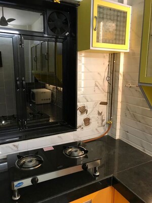 Kitchen in 1 BHK Apartment at Versova Manish CHS, Andheri West – for Rent