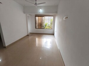Room in 1 BHK Apartment at Usha Kiran CHS Andheri, Andheri West – for Rent