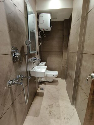 Bathroom in 3 BHK Apartment at Jhandewalan – for Rent