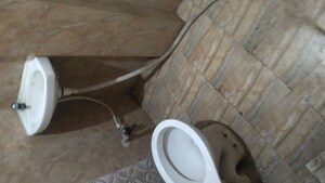 Bathroom in 3 BHK Apartment at Arun Vihar Sector 37, Sector 37 – for Rent