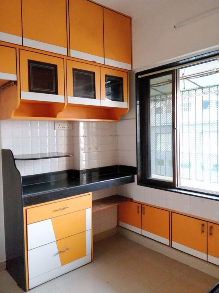 Kitchen, ajmera-bhakti-park 1 Bedroom 524 Sq.Ft. Apartment In Bhakti Park Mumbai 10348464