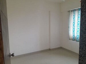 Room in 1 BHK Apartment at Kundan Easterlia, Lohgaon – for Rent