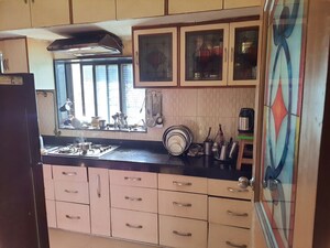 Kitchen in 2 BHK Apartment at Rohan Takshila, Andheri East – for Rent