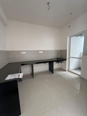 Kitchen in 2 BHK Apartment at Godrej Nurture Pune, Mamurdi – for Rent