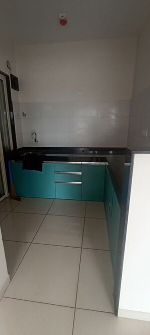 Kitchen in 2 BHK Apartment at Rama Metro Life Optima Residences, Tathawade – for Rent