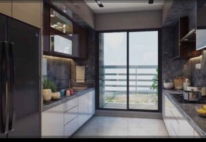 Kitchen in 2 BHK Apartment at Dhamji Shamji Mahavir Spring Tulip Phase 1, Pokhran Road No Two – for Sale
