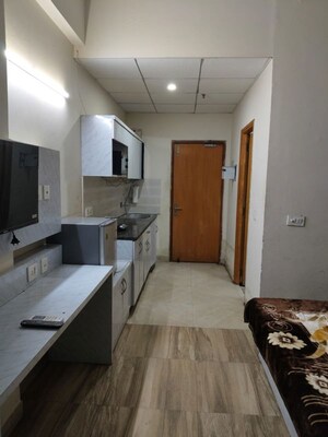 Kitchen in 1 RK Apartment at Paramount Golf Forest Studio Apartments - OAK Towe, Zeta I Greater Noida – for Rent