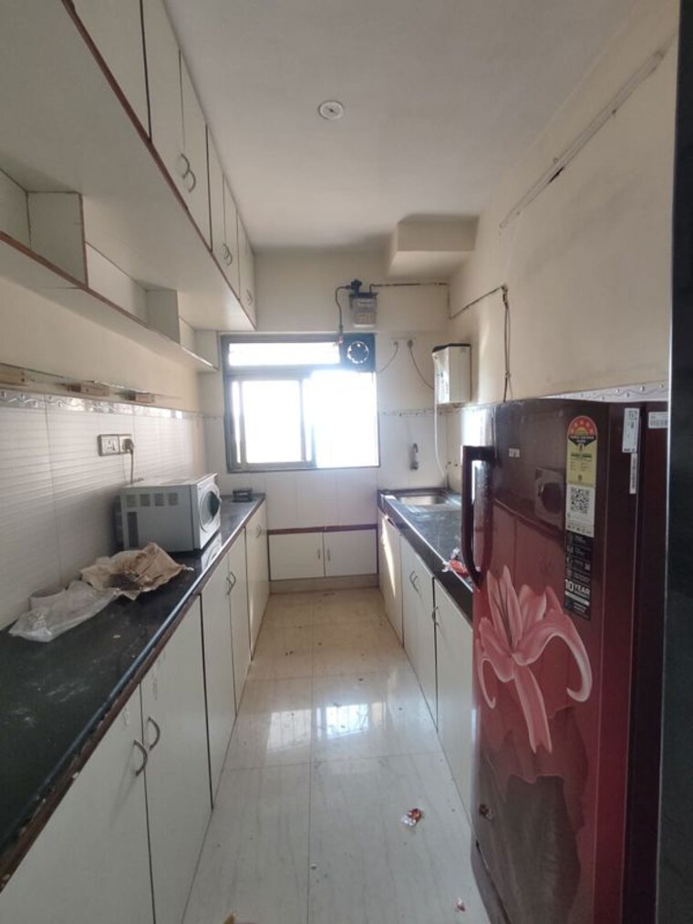 Kitchen, ajmera-bhakti-park 2 Bedroom 728 Sq.Ft. Apartment In Bhakti Park Mumbai 10348625