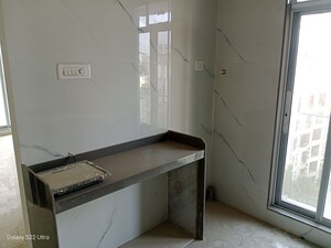 Kitchen in 1 BHK Apartment at Boa Vista CHS, Borivali West – for Sale