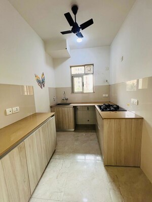 Kitchen in 1 BHK Apartment at Hiranandani Estate Rodas Enclave, Ghodbunder Road – for Rent