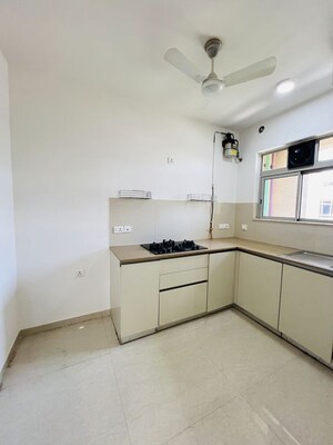 Kitchen in 2 BHK Apartment at Hiranandani Estate Barca, Ghodbunder Road – for Rent