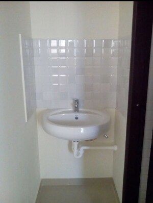 Bathroom in 2 BHK Apartment at Sai Aura, Ravet – for Rent