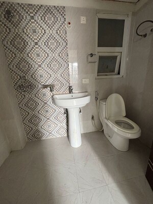 Bathroom in 2 BHK Apartment at AFOWO Raksha Addela, Sector 16c Greater Noida – for Sale