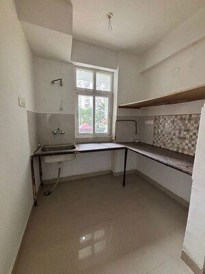 Kitchen in 2 BHK Apartment at AFOWO Raksha Addela, Sector 16c Greater Noida – for Sale