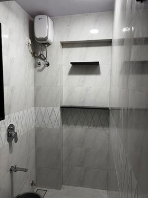 Bathroom in 2 BHK Apartment at Tilak Nagar – for Rent
