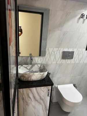 Bathroom in 2 BHK Apartment at Tilak Nagar – for Rent