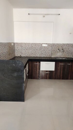 Kitchen in 3 BHK Apartment at Borate Jijai Nagari, Kothrud – for Rent