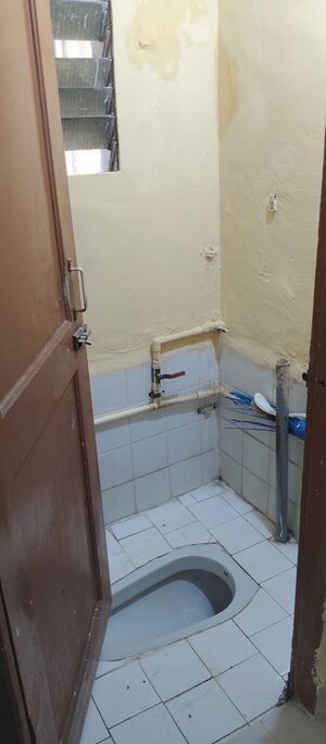 Bathroom in 1 RK Apartment at Nagari Niwara CHS, Goregaon East – for Rent
