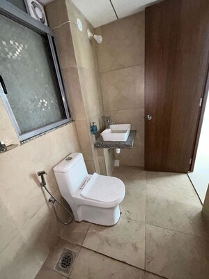 Bathroom in 1 BHK Apartment at Kalpataru Immensa, Kolshet Road – for Rent