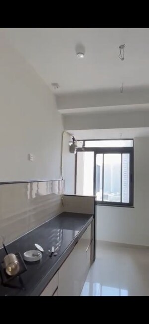 Room in 2 BHK Apartment at Dynamix Divum, Malad East – for Rent